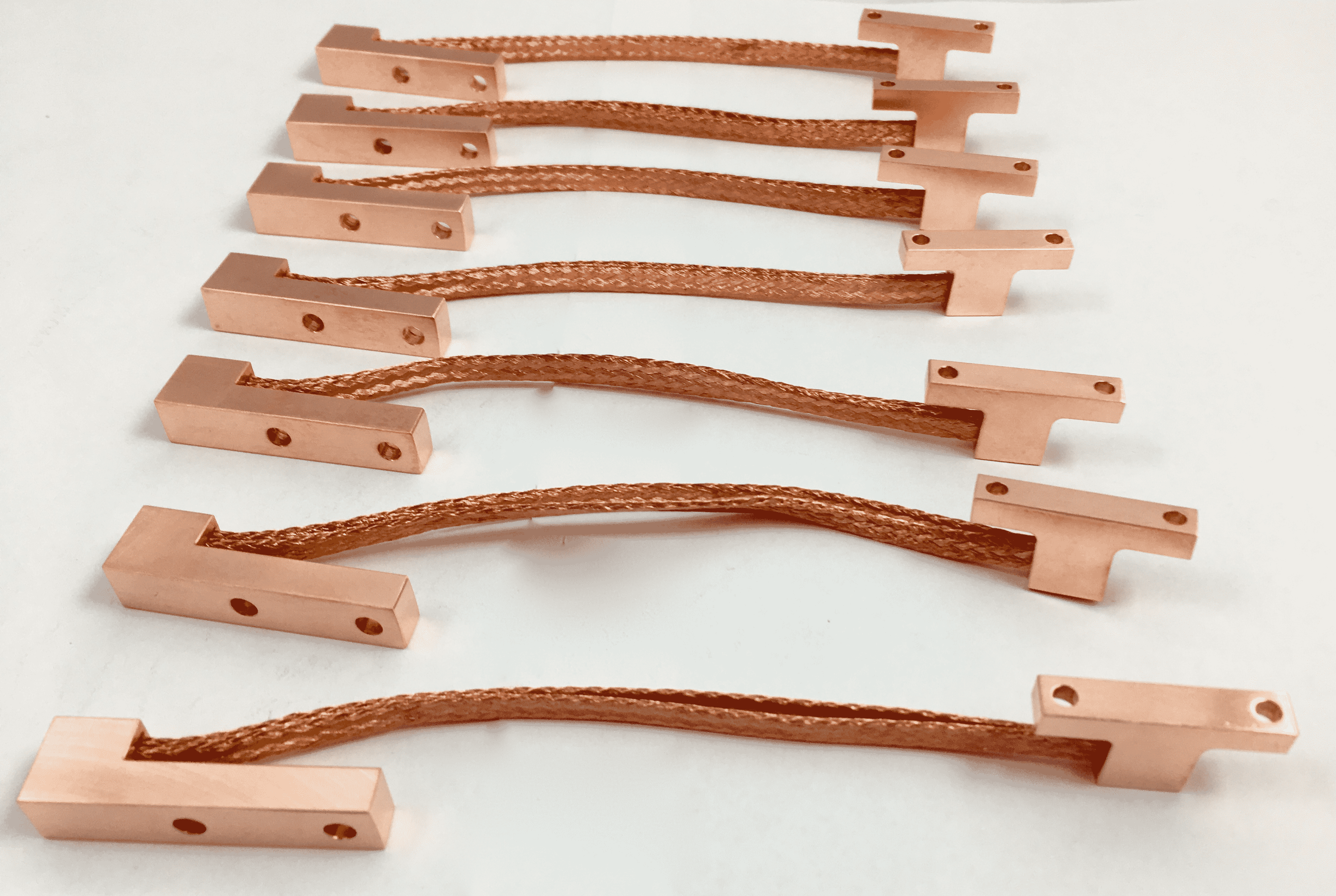 Specialized high purity braided copper thermal straps for moving heat while providing a high degree of rotational motion.